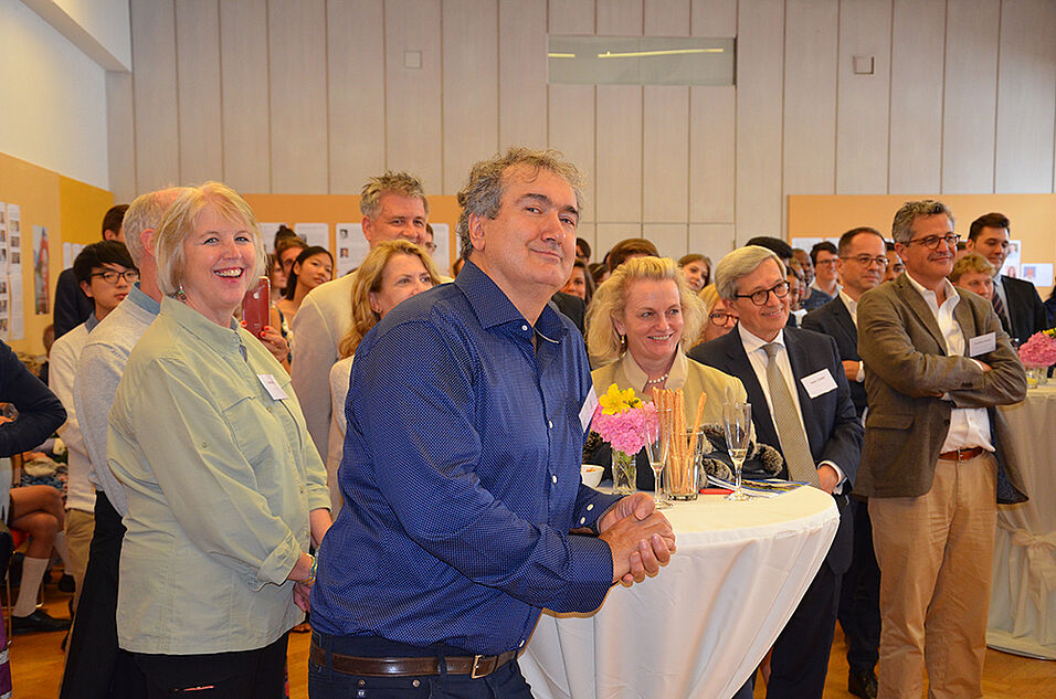 Participants, alumni and guests during the welcome speech of Director Meissel