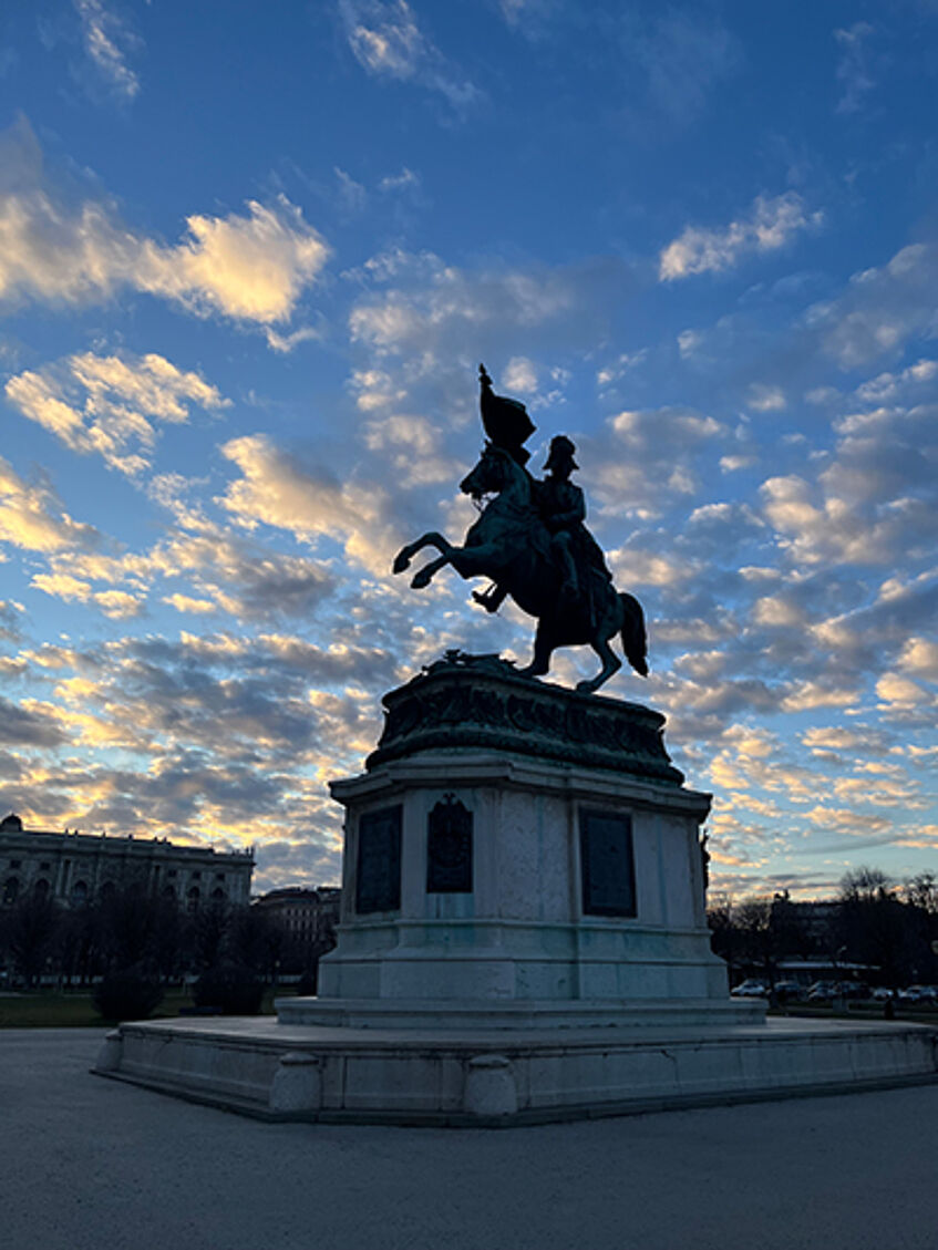 Statue of a rider at Heldenplatz in Vienna against cloudy sky